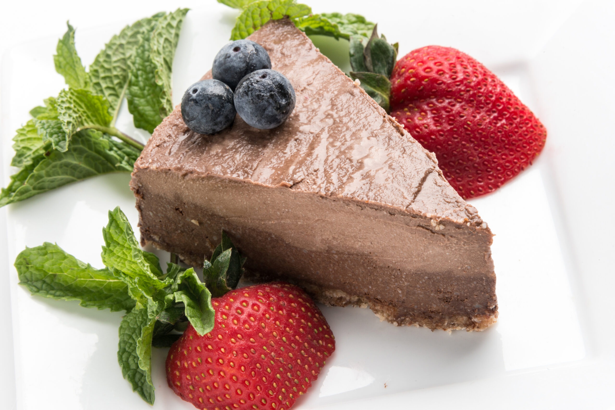 A table adorned with an assortment of pies and various delectable desserts, inviting and visually appealing.