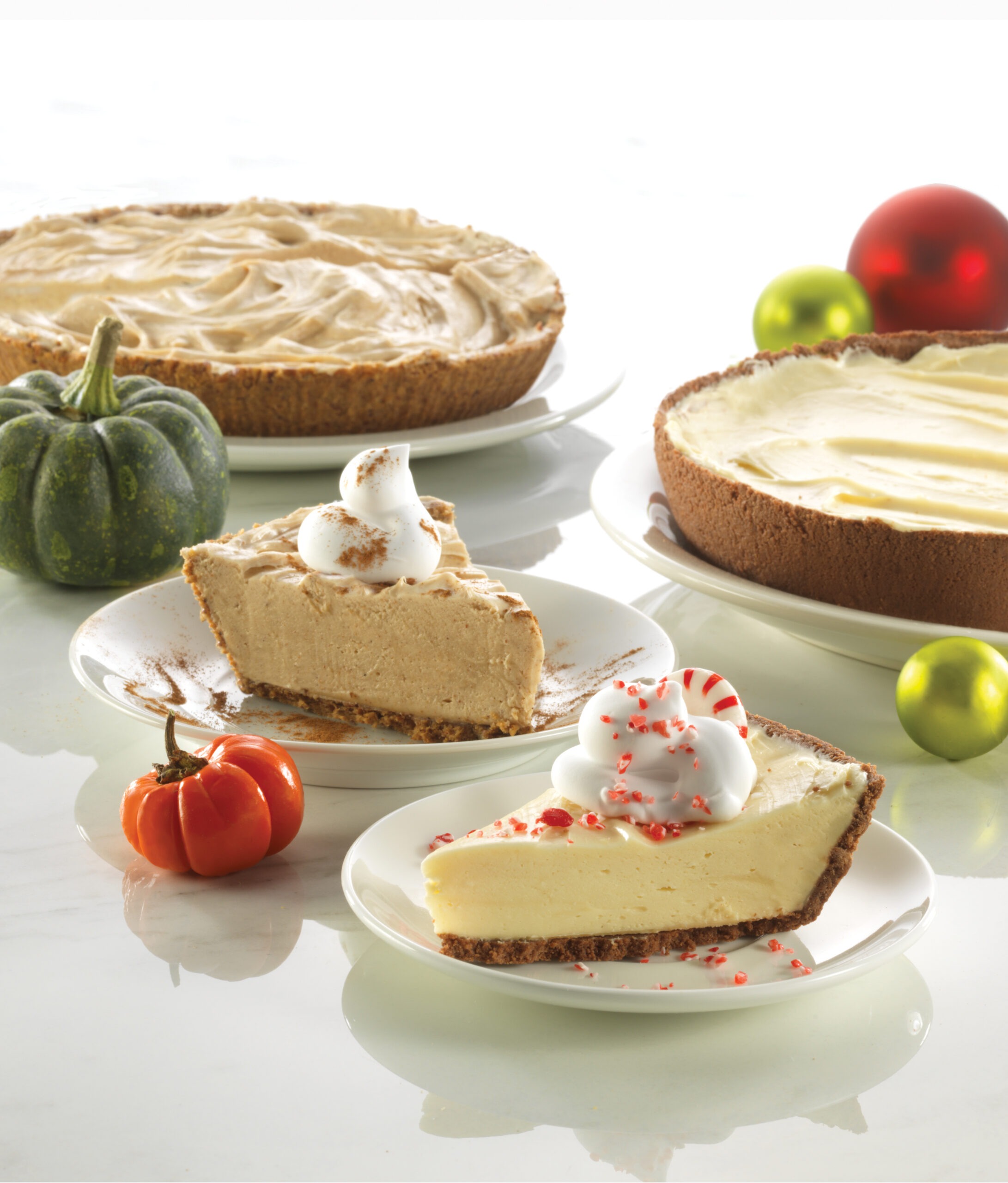 A table adorned with an assortment of pies and various delectable desserts, inviting and visually appealing.