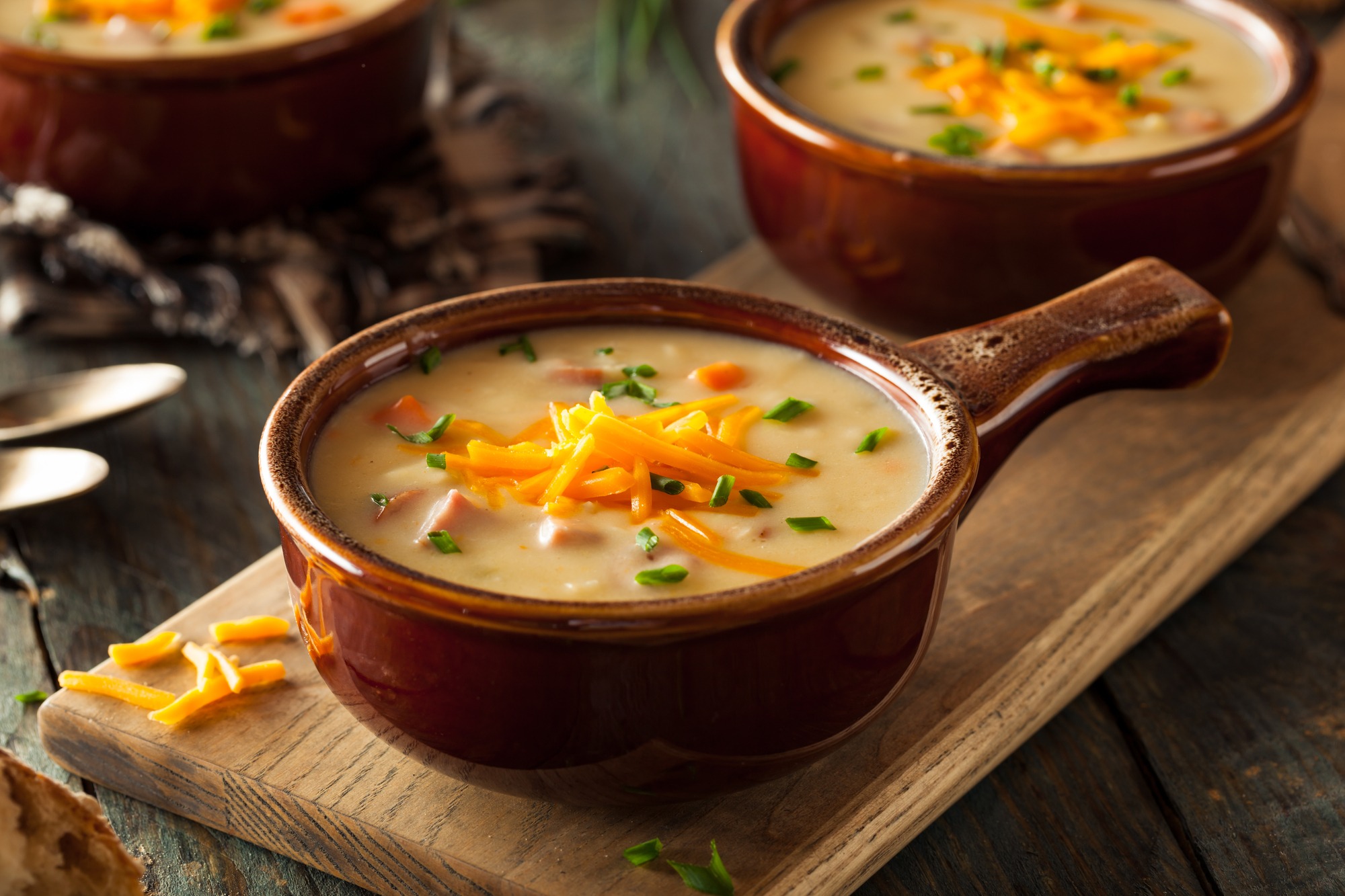 Homemade Beer Cheese Soup with Chives and Bread